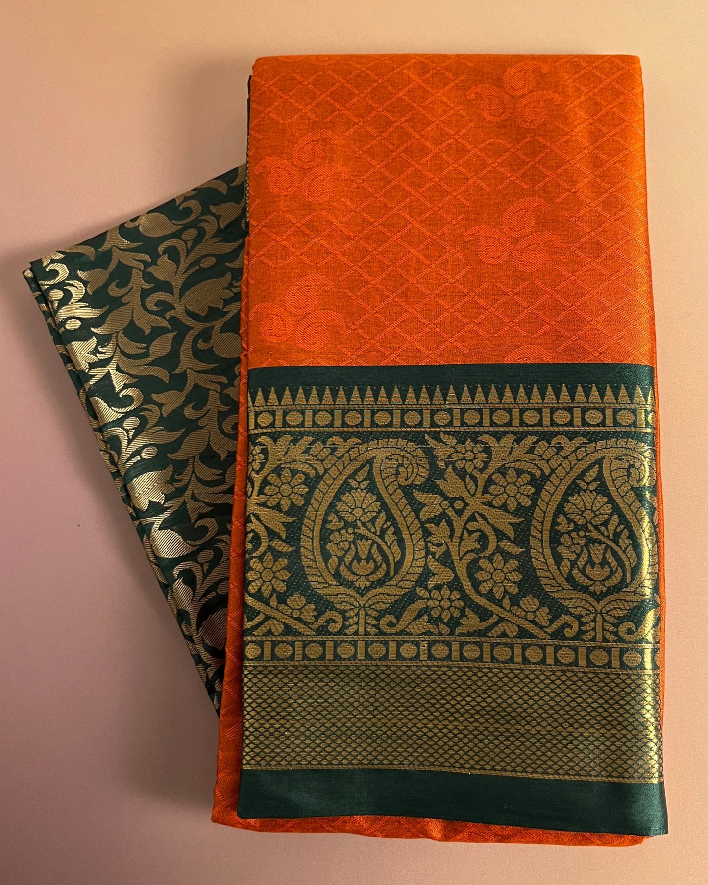 Kavya Orange Banarasi Silk Saree with Green Brocade Embriodery Border